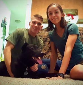 Marines Tom Buchanan and Taylor Heimann with their adopted dog, Heidi