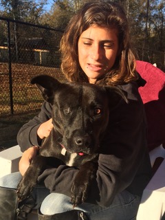 Tiffany gets some snuggle time with FOTAS Volunteer and Play Yard Supervisor, Darling Rios.