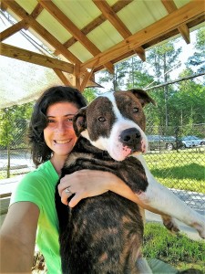 Claus enjoys some one-on-one time with FOTAS Volunteer and Canine Coach Darling Rios.