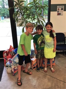 Three young friends from Wagener sell lemonade to raise money for FOTAS. 