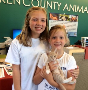 Sisters Rheney and Robbie Bates donated their own money to FOTAS and adopted Cotton.