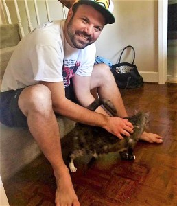 Jonathan adopted Ray, a blind cat who was brought to the County Shelter as a stray.