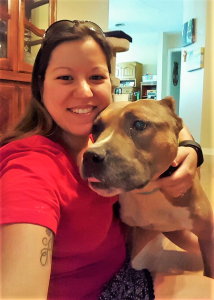 Ripley at home with his adopter, Amanda Brown of Augusta. 