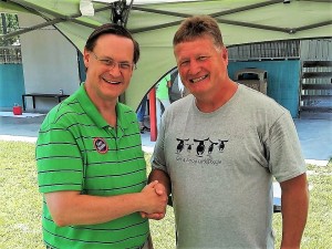 Bobby and Aiken County Council Chairman Gary Bunker catch up at a Shelter adoption event.