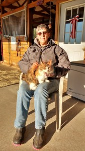 Diane Mansur with her adopted barn cat and super mouser, Callie.