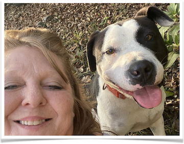 Groot (now named Buddy) gets goofy with his new owner, Trish Wilcher.