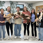 The Spanish Honors Club from South Aiken High School visited bringing treats and towels, socialized our puppies.