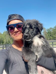 Sarah holding foster pup